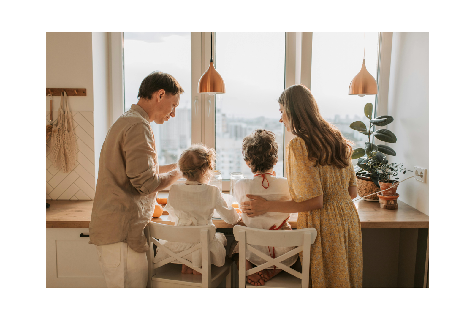 Family gathered at a kitchen table together — The Regulated Table by Intuitive Therapy Solutions